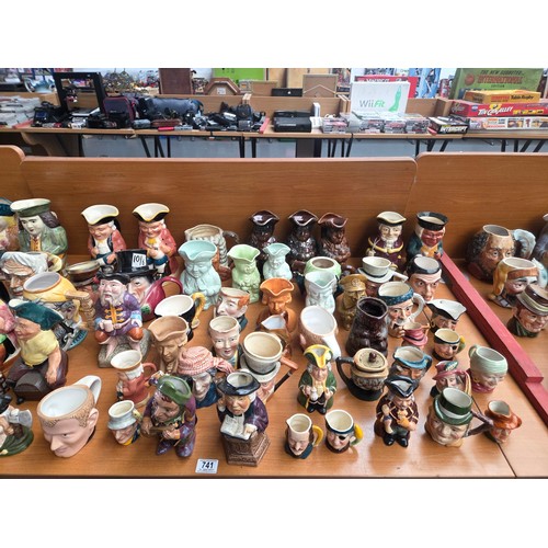 741 - A large variety of Toby jugs to include Lancaster, Staffordshire, Ridgeway etc.