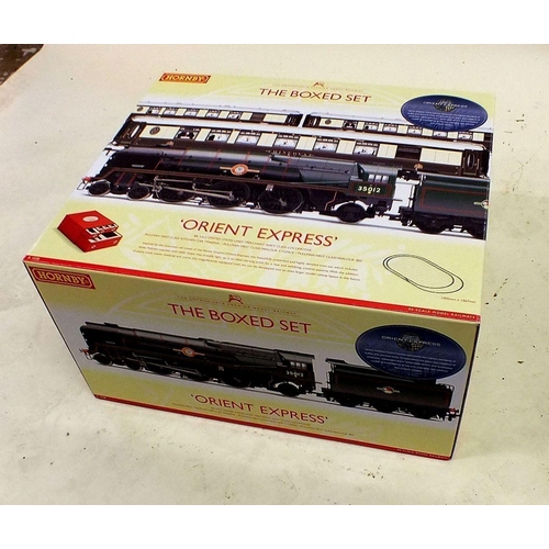 1068 - A Hornby Orient Express train set R1038, in original box.   Condition is near unused/mint.