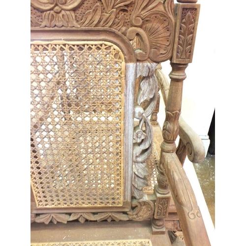 1149 - A set of eight Malaysian Colonial (Malaccan) carved hardwood dining chairs in mock Jacobean style wi... 