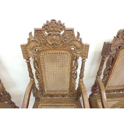 1150 - A set of eight Malaysian Colonial (Malaccan) carved hardwood dining chairs in mock Jacobean style wi... 