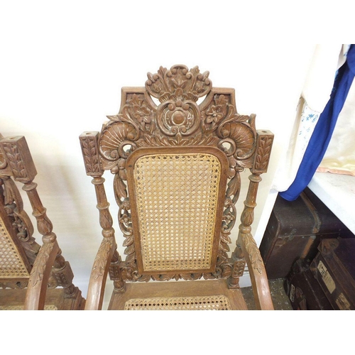 1150 - A set of eight Malaysian Colonial (Malaccan) carved hardwood dining chairs in mock Jacobean style wi... 