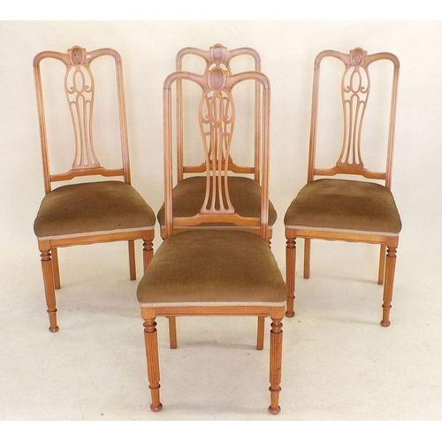 1151 - A set of four Edwardian satinwood dining chairs with marquetry interlaced splat back