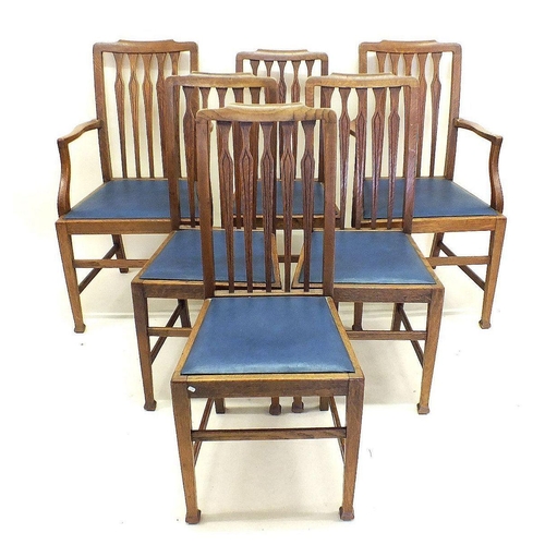 1152 - A set of six mid oak Edwardian dining chairs with slat backs (two carvers and four diners)