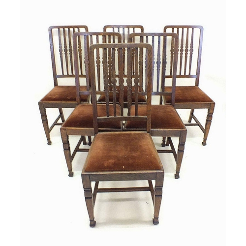 1153 - A set of six 1920's oak slat back dining chairs