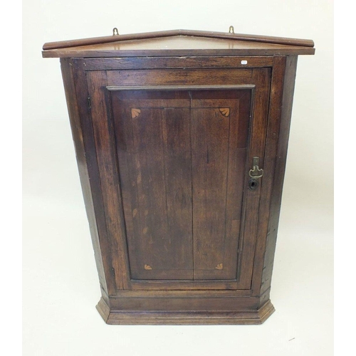 1158 - An 18th century mahogany corner wall cupboard with paterae inlay