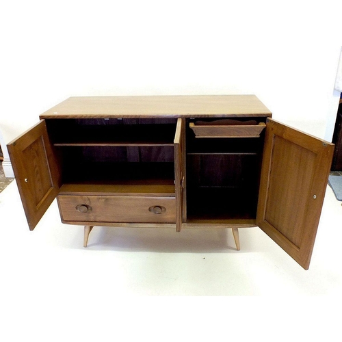 1160 - A retro Ercol elm sideboard with three cupboards and a drawer, cutlery drawer within