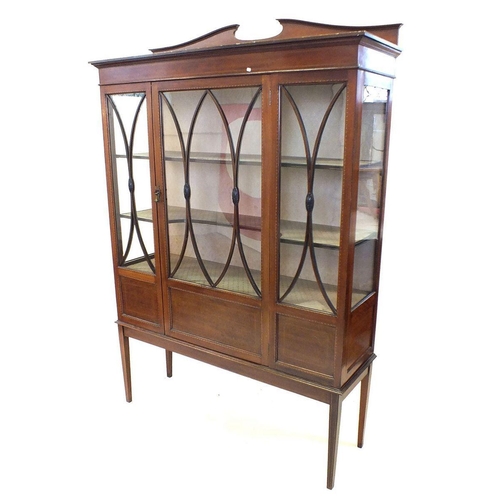 1195 - An Edwardian mahogany display cabinet with chequered stringing