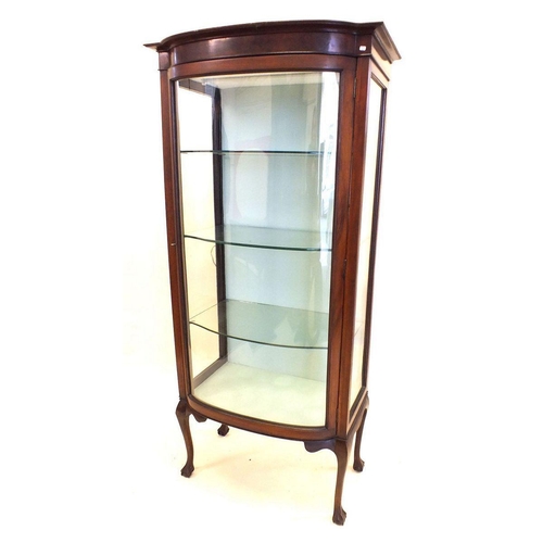 1206 - An early 20th century vitrine display cabinet with bow fronted single door all raised on cabriole su... 