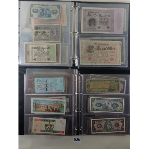 127A - A quantity of World banknotes in albums (2) including: Album (A) German notes circa 1920, (23). Albu... 