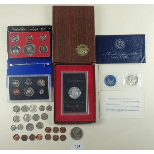 154 - A quantity of USA coinage including: cents, quarters etc, loose plus proof sets 1983 & 1975, unc sil... 