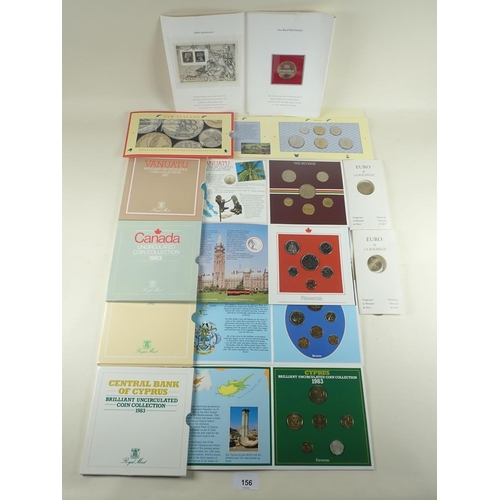 156 - A quantity of Royal Mint issue folders of World coinage including: Cyprus set 1983, Seychelles set 1... 