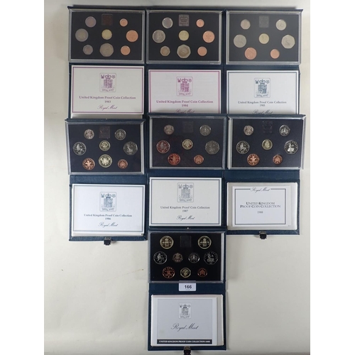 166 - Royal mint issue: UK proof coin collections. Years: 1983, 84 Scottish, 85 Welsh, 86 Commonwealth, 87... 