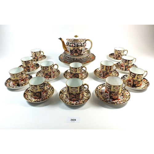 369 - A Royal Crown Derby Imari part set of twelve coffee cups and eleven saucers, four tea plates, one sm... 