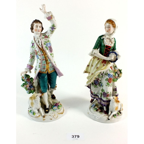 379 - A pair of 19thC porcelain figurines with gold anchor marks to rear, possibly Samson of Paris.   26.5... 