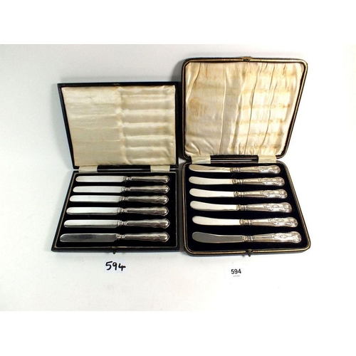 594 - Two cased sets of silver handled tea knives