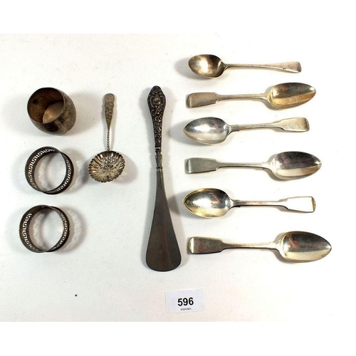 596 - A group of silver teaspoons and three napkin rings etc, 194g