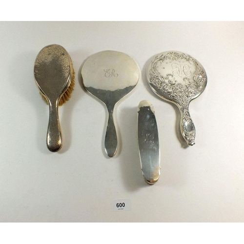 600 - Two silver hand mirrors and two silver brushes