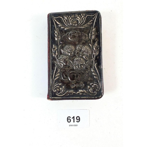 619 - A leather prayer book with silver frontispiece embossed angel heads, Birmingham 1905