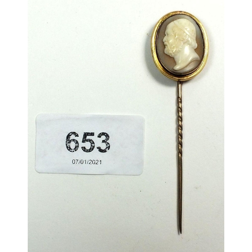 653 - A Victorian cameo stick pin carved with a man, in yellow metal mount