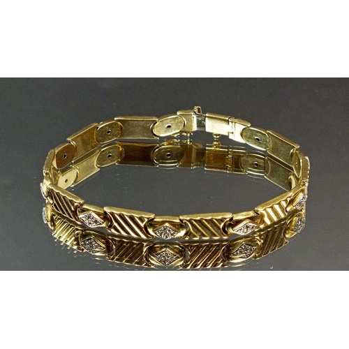 668 - An 18 carat gold link and diamond set bracelet, 20cm long, 18.8g