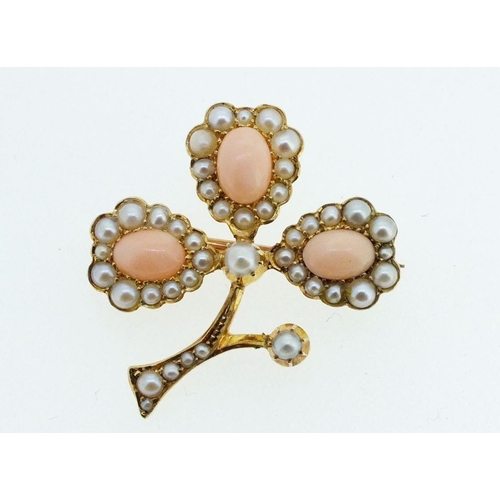 675 - A Victorian 15ct gold leaf form brooch set coral and seed pearls, 2.5cm x 2.5cm, 4.2gm