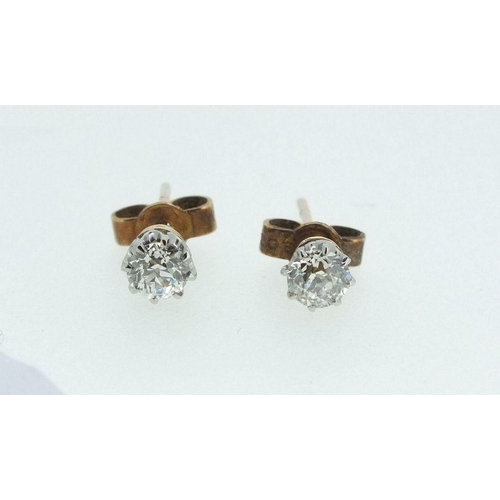 681 - A pair of 9ct gold diamond stud earrings (silver gilt butterflies) 0.5ct total