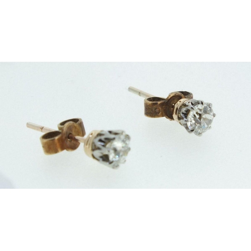 681 - A pair of 9ct gold diamond stud earrings (silver gilt butterflies) 0.5ct total