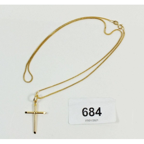 684 - A 14ct gold chain and crucifix, 3g