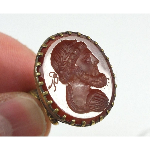 692 - A gold plated seal with carved cornelian intaglio