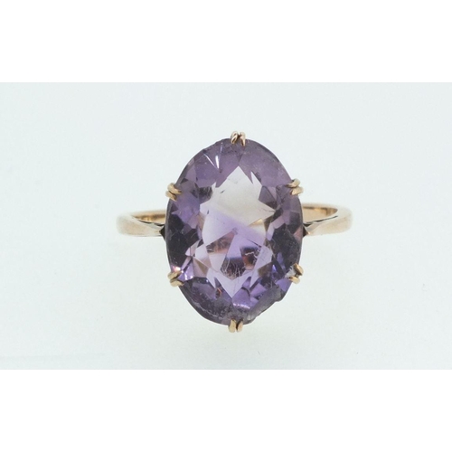 706 - A 9ct rose gold ring set amethyst, size M, 3g