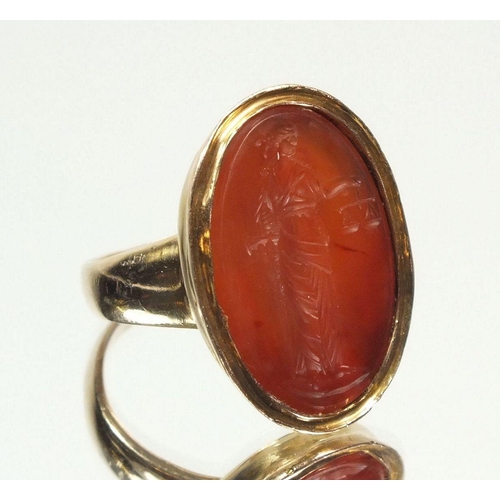 708 - A 14ct gold intaglio ring, 16g - size T