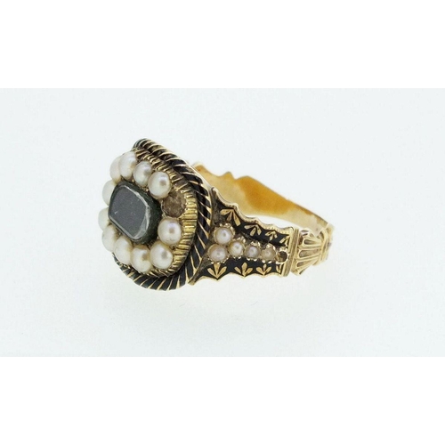 711 - A Georgian black enamel and split pearl set mourning ring with hair panel, size M-N, five pearls def... 