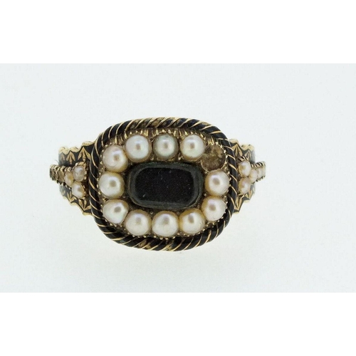 711 - A Georgian black enamel and split pearl set mourning ring with hair panel, size M-N, five pearls def... 