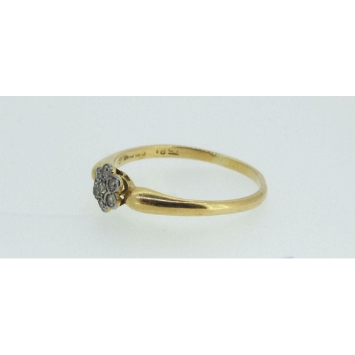 717 - An Edwardian small diamond cluster ring, size S