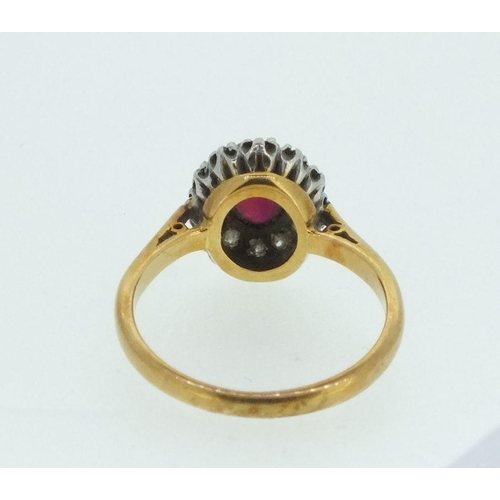 722 - A Victorian 18ct gold and platinum diamond and ruby cluster ring,  size I, 3.4g