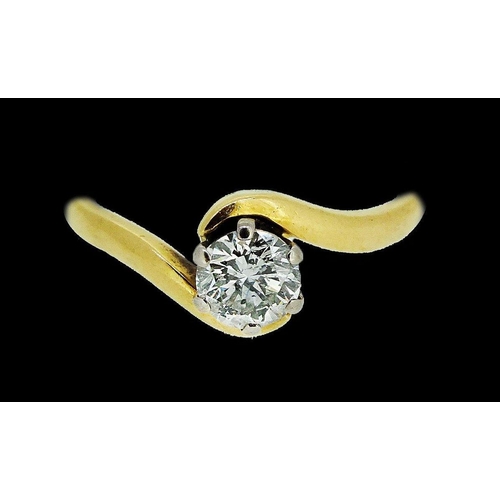 725 - An 18 carat gold crossover set solitaire diamond ring, (approx 60/70 pts), size O to P