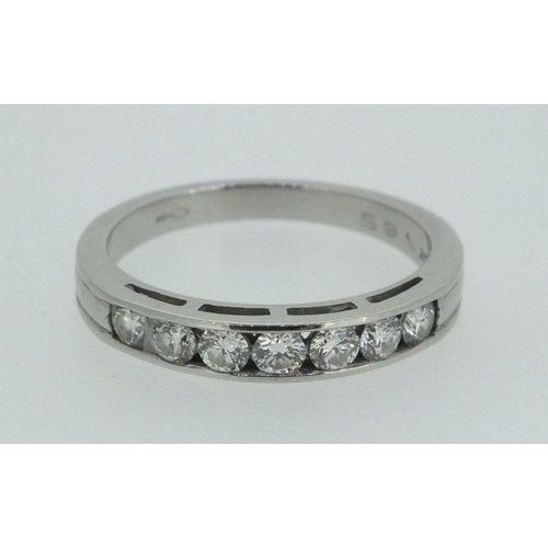 727 - A platinum seven stone diamond half eternity ring, (total 1/2 ct diamonds), size Q