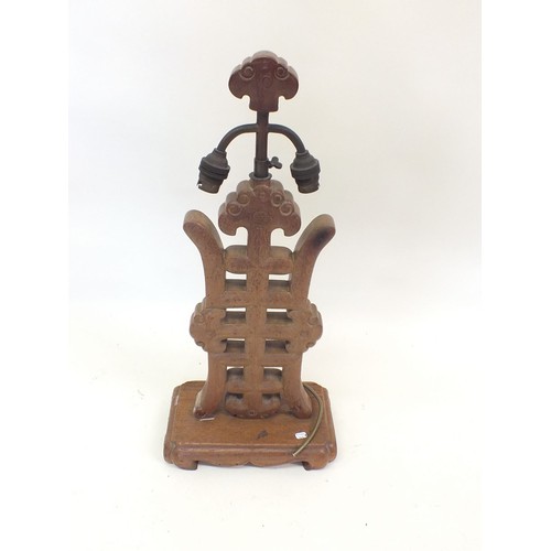 1191 - A Chinese carved wooden table lamp, 43cm