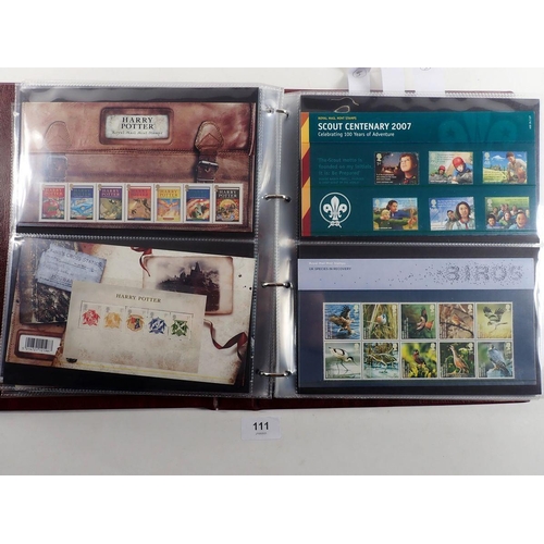 111 - GB: Royal Mail Presentation Pack album of mint decimal stamps in over 65 packs, 2006-2010. Total FV ... 