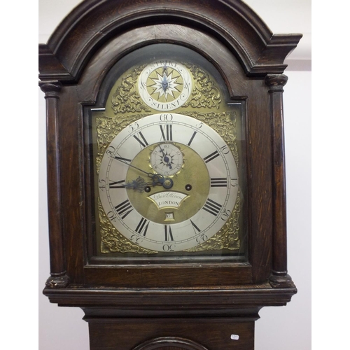 1218 - An oak cased long case clock with eight day striking movement and brass face, signed David Rivers, L... 