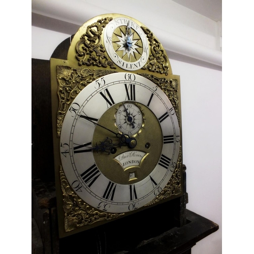 1218 - An oak cased long case clock with eight day striking movement and brass face, signed David Rivers, L... 