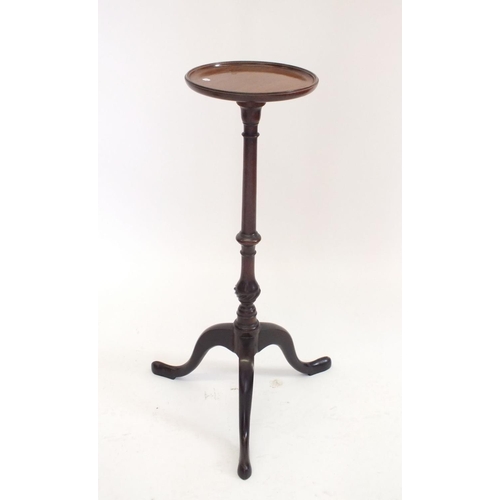 1224 - A mahogany jardiniere stand on slender column and triple cabriole supports