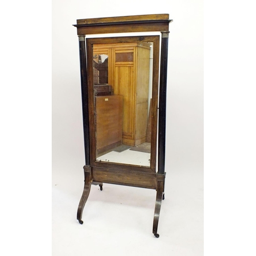 1226 - An early 19th century rosewood and ebony cheval mirror