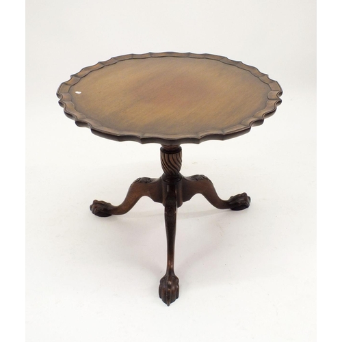 1243 - A mahogany Chippendale style pie crust edge occassional table on three claw feet