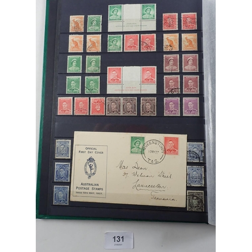 131 - Australia: Green Leuchtturm 30-page stock-book full of 1936-1963 defin, commem, officials and postag... 