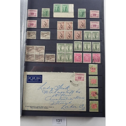 131 - Australia: Green Leuchtturm 30-page stock-book full of 1936-1963 defin, commem, officials and postag... 