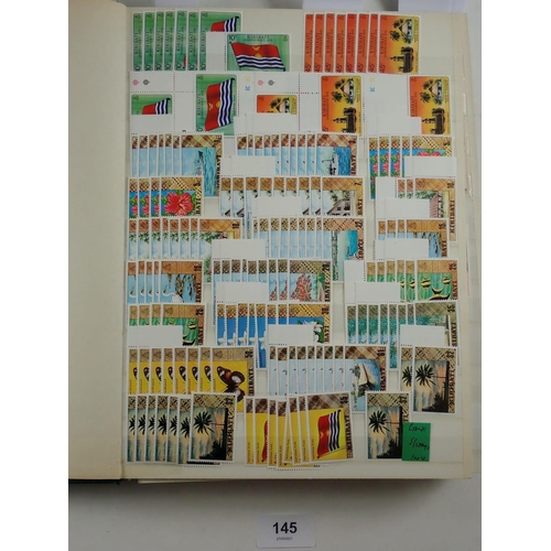 145 - Kiribati: Large 32-page stock-book full of mint & used defin, commem, official, postage due & 4 page... 