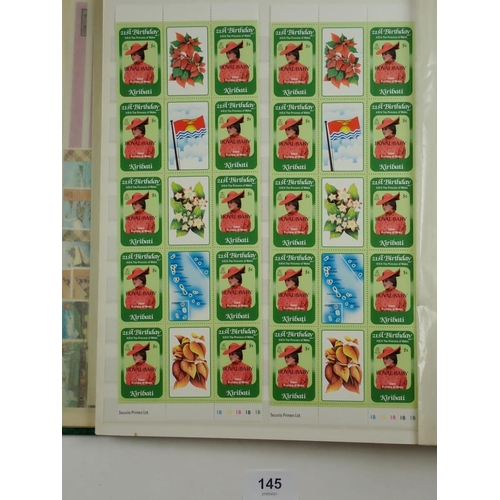 145 - Kiribati: Large 32-page stock-book full of mint & used defin, commem, official, postage due & 4 page... 