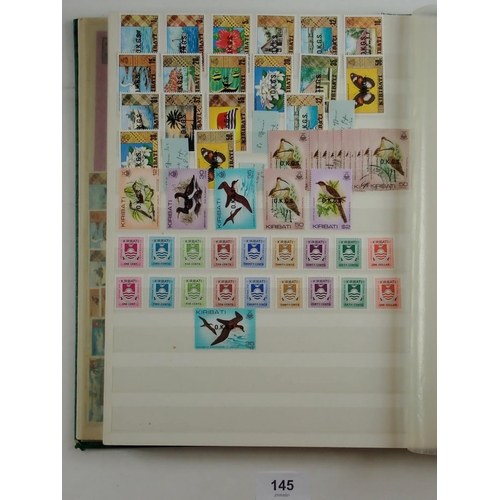 145 - Kiribati: Large 32-page stock-book full of mint & used defin, commem, official, postage due & 4 page... 