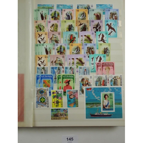 145 - Kiribati: Large 32-page stock-book full of mint & used defin, commem, official, postage due & 4 page... 